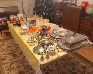 Table of collectibles and silverplate