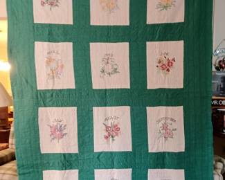 Beautiful handmade quilt with floral embroidery 