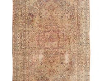 370
A Lavar Kerman rug
Circa 1880; Southeast Persia
Inscribed in a cartouche
The wool on cotton foundation rug having a star medallion on the dense floral field in rose, burgundy, light blue, brown, and ivory within a dense palmette vinery border
25' L x 18' W
Estimate: $8,000 - $12,000