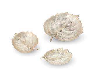 413
Three Buccellati sterling silver leaf-form dishes
Mid/late 20th century
Each marked for Buccellati and for sterling
Comprising a pair of graduated dishes and a single dish
3 pieces
Largest: 1.5" H x 8.5" W x 7.25" D; Smallest: 1.125" H x 5.625" W x 3.625" D
14.5 oz. troy approximately
Estimate: $600 - $800