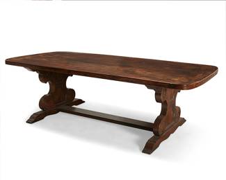 317
An Italian Renaissance-style walnut trestle table
20th century
Raised on shaped supports and trestle feet joined by a stretcher
30" H x 95" W x 48" D
Estimate: $500 - $700