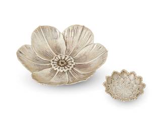 410
Two Buccellati sterling silver floriform dishes
Late 20th/early 21st century
Each with mark of Gianmaria Buccellati and marked: 925 / Italy
2 pieces
Larger: 1.5" H x 7.25" Dia.; Smaller: 0.75" H x 3.25" Dia.
7.5 oz. troy approximately
Estimate: $400 - $600