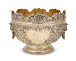 391
A Victorian sterling silver monteith
1894
Marked for sterling, for London, and date marked; maker's mark for Walter and John Barnard
With a gilt interior, repoussé scrollwork, and opposed lion's head bail handles, raised on a round foot
7.75" H x 11.5" W x 10" D
43.1 oz. troy approximately
Estimate: $800 - $1,200