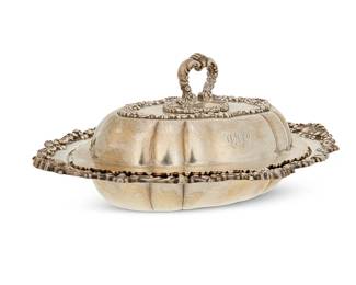 178
A Shreve & Co. sterling silver entrée dish and cover
Early 20th century
Dish marked: Shreve & Co. / Sterling / 805
Of oval form, with scroll and shell decoration around the edge of the dish and the top of the cover, personalized
5" H x 13.25" W x 9.875" D
27.7 oz. troy approximately
Estimate: $500 - $700