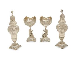 21
Two pairs of German .800 silver salt cellars and pepper casters
Late 19th/early 20th century
Each with German hallmarks for 800 silver
Each with figures of putti and pierced foot
4 pieces
Each caster: 8.625" H x 2.5" Dia.; Each salt: 6" H x 3.5" Dia.
Total weight: 25.2 oz. troy approximately
Estimate: $1,000 - $1,500