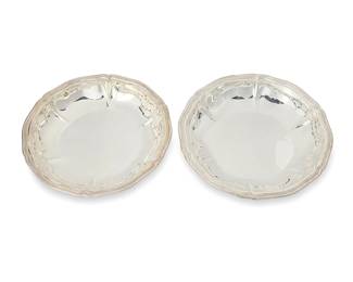163
A pair of Mexican .900 silver shallow bowls
Mid-20th century
Each with mark of Ortega and numbered respectively: 3875 / 3890
Each with scalloped rim
2 pieces
Each: 2.125" H x 13.25" Dia.
72.4 oz. troy approximately
Estimate: $1,500 - $2,000