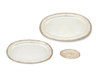 169
Three Sanborns sterling silver trays
Mid-20th century; Mexico City, Mexico
Each stamped to underside: [Three owls] / Sanborns Mexico / Sterling
Comprising a graduated pair of oval serving trays and a sauce boat stand
3 pieces
Largest tray: 1" H x 24.5" W x 17.25" D; Sauce tray: 0.75" H x 10.25" W x 6.625" D
Total weight: 171.3 oz. troy approximately
Estimate: $600 - $800