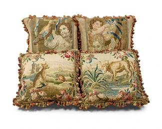 38
Two pairs of tapestry upholstered pillows
Tapestries 18th/19th century
Each with passementerie trim, comprising one pair depicting animal figures and another pair depicting child figures
4 pieces
Animal pair: 20" H x 20" W x 8" D; Child pair: 20" H x 21" W x 8.5" D
Estimate: $400 - $600
