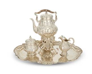 24
A German .800 silver tea and coffee service
19th/early 20th century
With Hanau hallmarks and: 800; maker's mark for Weinranck & Schmidt
Comprising a hot water kettle with stand and burner (14.75" H x 10" W x 9" D), a coffee pot (11.75" H x 10" W x 5.75" D), a teapot (9.5" H x 9.5" W x 6.625" D), a covered sugar (6.75" H x 7" W x 5.25" D), and a creamer (6.5" H x 5" W x 4.25" D), all set on a tray (1.5" H x 18" W x 24.25" D)
6 pieces
Total weight: 183 oz. troy approximately
Estimate: $4,000 - $6,000