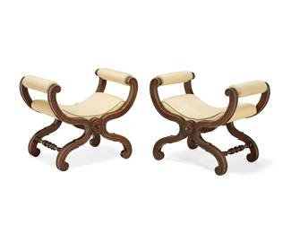 337
A pair of Baroque-style carved wood curule-form stools
Late 19th/early 20th century
Each with scrolled X-form frame joined by turned stretchers, with pale yellow upholstered arms and seat highlighted by light blue piping
2 pieces
Each: 23.5" H x 28.5" W x 20.5" D
Estimate: $400 - $600