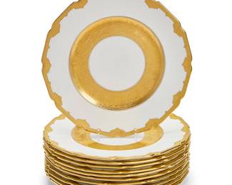 49
A set of eleven Royal Doulton porcelain dinner plates
Date codes for 1908-09
Each stamped to underside: Royal Doulton / England; further marked with puce-printed factory mark, impressed date codes, and painted pattern: HB6778/E4637
Each with pebbled gilt rims on white ground
11 pieces
Each: 10.5" Dia.
Estimate: $300 - $500