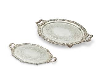 173
Four large silver-plated handled oval serving trays
Late 19th/20th century
Two with Sheffield plate marks; one marked: Gorham EPNS / Y1107; another marked: T & A
Each handled tray with central chased scroll decoration and ornate rim with various motifs such as egg and dart, fruits, or foliate motifs
4 pieces
Largest: 33.5" W x 21.5" D; Smallest: 28.25" W x 17" D
Estimate: $300 - $500