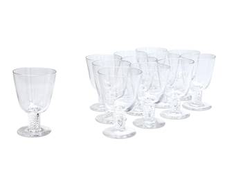 245
A set of twelve Steuben glass water goblets
20th century
Etched: Steuben
Pattern 8011, the bowls supported by air twist stems
12 pieces
Each: 5.75" H
Estimate: $800 - $1,200