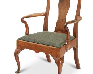 153
A George I walnut open armchair
Early 18th century
With a fiddle-back splat, shepherd's crook curvilinear armrests, and a green upholstered seat, raised on front cabriole legs ending in pad feet
39" H x 26" W x 21" D
Estimate: $300 - $500