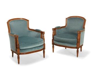 293
A pair of Louis XVI-style carved wood bergères
Early 20th century
Each with carved acanthus and floral medallion accents to support fronts and armrest terminals, upholstered in a light blue velvet fabric with passementerie trim
2 pieces
Each: 33.5" H x 27.5" W x 28" D
Estimate: $300 - $500