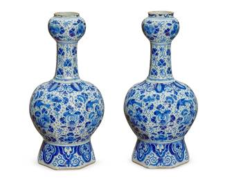 273
A pair of Delft blue and white pottery garlic-head vases
19th century
Each with indistinct blue marking to underside
Each decorated with floral and scrolled motifs
2 pieces
Each: 13.5" H x 7" Dia.
Estimate: $300 - $500