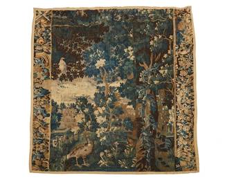 336
A Flemish verdure tapestry
18th century
The rectangular panel depicting trees and game birds in a landscape with a structure in the distance, and with floral borders with birds to each side
64.5" H x 75.5" W
Estimate: $700 - $900