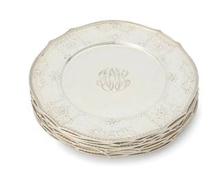 179
A set of twelve Gorham sterling silver service plates
Early/mid-20th century
Each marked for Gorham and for sterling
Retailed by Grogan Company, each rim with foliate swags and suspended flowerheads within a Vitruvian scroll rim, personalized
12 pieces
Each: 11" Dia.
253 oz. troy approximately
Estimate: $5,000 - $7,000