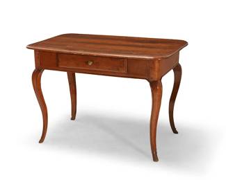 289
A Continental fruitwood table
Late 18th/early 19th century
With a single drawer, raised on cabriole legs terminating in stylized hoof feet
29" H x 42" W x 26.5" D
Estimate: $400 - $600