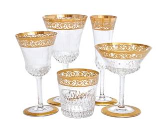 57
A suite of Saint-Louis 'Thistle' glassware
20th century
Each with etched factory marks
Comprising twelve 7.5" water goblets, twelve 7.5" champagne flutes, seven 6.25" white wine glasses, two 5.5" champagne coupes, and twelve 3.5" old-fashioned glasses
45 pieces
Estimate: $3,000 - $5,000