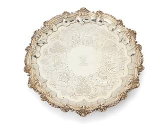 174
A George IV sterling silver salver
1828
Marked for sterling, for London, and date marked; maker's mark: IW [Joseph Wilson or John Wakefield]
With a shell-decorated edge and an engraved plume armorial, on three scroll feet
1" H x 9" Dia.
14.4 oz. troy approximately
Estimate: $800 - $1,200