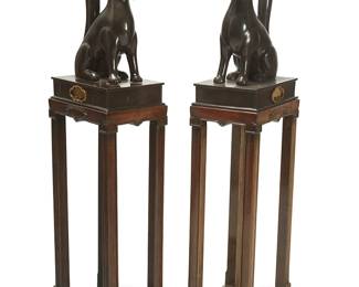 341
A pair of Japanese patinated bronze kitsune fox figures
Meiji Era (1868-1912), 1870
One plinth bearing Japanese script, dated by inscription to Meiji third year
Nakagawa Joeki VIII (1830-1877), each figure seated on a rectangular plinth, one depicted holding a ball in its mouth, the other holding a scroll, each set on a tall Japanese stained wood stand
4 pieces
Each fox with plinth: 22" H x 10" W x 16" D; Each stand: 36" H x 10.5" W x 15.5" D
Estimate: $4,000 - $6,000