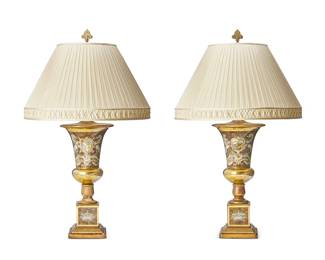 47
A pair of eglomisé glass campana urn-form table lamps
20th century
Each urn with armorial inscribed 'Sola Virtus Invicta,' with sections of gilt turned wood, on square wood and glass bases, with pleated fabric shades, electrified
2 pieces
Overall 39" H; Height to top of urn: 23" H
Estimate: $300 - $500