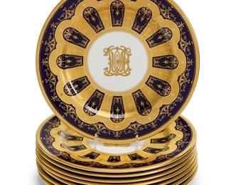 283
A set of eight Coalport porcelain dinner plates
Early 20th century
Each with green printed factory mark: England / Coalport / AD 1750; painted pattern: 6523/C
Each with gilt and cobalt blue decoration and centered by an indistinct gilt monogram, personalized
8 pieces
Each: 10.375" Dia.
Estimate: $200 - $300