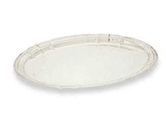 183
A Reed & Barton sterling silver 'Newport' oval tray
1951
Marked to underside: Reed & Barton Sterling / X596 / Newport; with date mark
With scalloped rim
1" H x 17.75" W x 12" D
37 oz. troy approximately
Estimate: $700 - $900