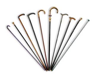 110
A group of ten walking sticks
20th century
Comprising six ebonized metal-mounted wood sticks, some silver-toned and some gold-toned, one with faux jewels, two other wood canes, and two glass canes
10 pieces
Longest: 36.5" L
Estimate: $300 - $500
