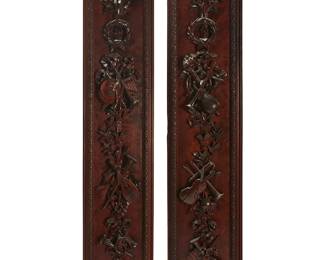 288
A pair of George III-style carved wood panels
20th century
Each with ribboned musical trophy pendants
2 pieces
91.5" H x 18" W x 4" D
Estimate: $700 - $900