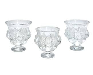 290
Three Lalique glass 'Dampierre' footed vases
Late 20th/early 21st century
Each etched: Lalique ® France [post-1978]
Designed 1948 by Marc Lalique (1900-1977), each clear and frosted glass vase featuring bird figures in high relief
3 pieces
Each: 5" H x 4.75" Dia.
Estimate: $800 - $1,000