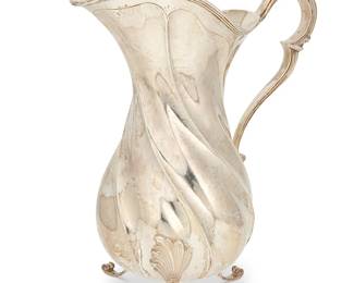 398
A Buccellati sterling silver pitcher
Late 20th century
Marked for Buccellati
With a slightly swirled body, a folded rim, and three scrolled feet
11.25" H x 9.5" W x 5" D
37.605 oz. troy approximately
Estimate: $1,200 - $1,800