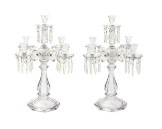 275
A pair of Continental glass five-light candelabra
20th century
The drip pans hung with facet cut prisms
2 pieces
Each: 25" H x 18" W
Estimate: $700 - $900
