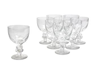 260
A set of nine Lalique glass 'Clos Vougeot' wine goblets
20th century
Each etched: Lalique / France
The bowls raised on grape cluster stems
9 pieces
Each: 6.125" H x 4" Dia.
Estimate: $600 - $800