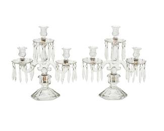 155
A pair of Continental molded glass three-light candelabra
20th century
The drip pans hung with facet cut prisms
2 pieces
Each: 15.5" H x 16" W
Estimate: $300 - $500