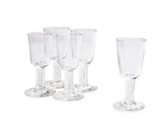 319
A set of twenty Steuben glass cordials
20th century
Etched: Steuben
Each featuring air twist stems
20 pieces
Each: 3.875" H
Estimate: $600 - $800