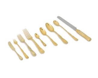 18
A Tiffany & Co. gilt sterling silver 'Chrysanthemum' flatware service
Each marked: Tiffany & Co. / Sterling
Comprising 12 dinner forks, 11 salad forks, 12 cocktail forks, 12 dinner knives, 12 butter knives, 12 soup spoons, 12 teaspoons, 12 iced tea spoons, and 8 demitasse spoons, together with 1 demitasse spoon in the 'Audubon' pattern
104 pieces
Largest: 10.25" L
Weighable sterling: 151.2 oz. troy approximately
Estimate: $10,000 - $15,000