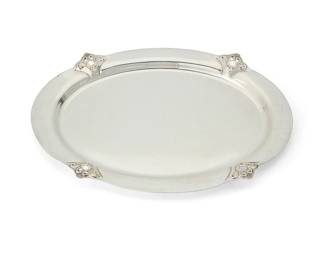 188
An International sterling silver 'Royal Danish' tray
Early 20th century
Marked to underside: Royal Danish / U.S.A. / W412 / International Sterling
With repoussé and pierced scrolled accents at corners
1.25" H x 18.25" W x 13.125" D
51.6 oz. troy approximately
Estimate: $1,000 - $1,500