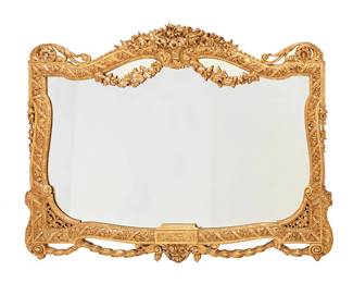 282
A Napoleon III-style carved giltwood wall mirror
20th century
The frame with floral motifs throughout including flanking bellflowers, the upper and lower edges with laurel swags, and openwork corners
42.5" H x 55.5" W
Estimate: $500 - $700