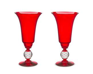 345
A pair of ruby and clear controlled bubble glass vases
Late 20th century
Possibly by Pairpoint
2 pieces
Each: 13" H x 6.75" Dia.
Estimate: $200 - $300