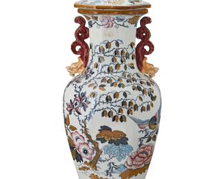 69
A Mason's Ironstone baluster-form covered vase
Late 19th century
With blue printed factory mark above: England; red painted: 1976
Decorated in the Chinese style with floral motifs, flanked by dragon-form handles and lid finial
27.5" H x 11" Dia.
Estimate: $200 - $300