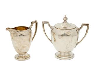 392
A Reed & Barton sterling silver coffee service
1945
Marked for Reed & Barton, with date mark; each numbered: 87
Comprising a coffee pot (10" H x 10" W x 5" D), a creamer (5.25" H x 5.25" W x 3.25" D), and a covered sugar (6.5" H x 7" W x 4.625" D)
3 pieces
52.9 oz. troy approximately
Estimate: $1,000 - $1,500