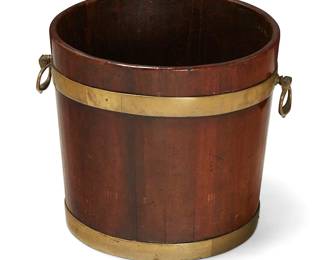65
A George III brass-bound mahogany bucket
Late 18th/early 19th century
With opposed ring handles
13.5" H x 16.5" W x 14.5" D
Estimate: $200 - $300