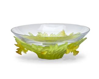 239
A Daum pâte-de-verre bowl
Late 20th/early 21st century
Signed and inscribed: Daum / France
The clear glass bowl set in a green and yellow pâte-de-verre daffodil base
4.25" H x 12" Dia.
Estimate: $400 - $600