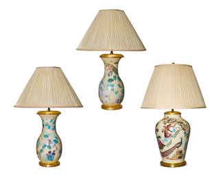 72
Three decalcomania-style glass urn-form table lamps
20th/21st century
Comprising a pair of baluster-form vases and a reverse-baluster vase, the pair decorated with various fruit, and the larger single decorated with birds and insects, all on a pale yellow ground, each with giltwood mounts and pleated fabric shades, electrified
3 pieces
Pair overall: 27.5" H x 19.5" Dia.; Single overall: 28.5" H x 18" Dia.
Estimate: $500 - $800
