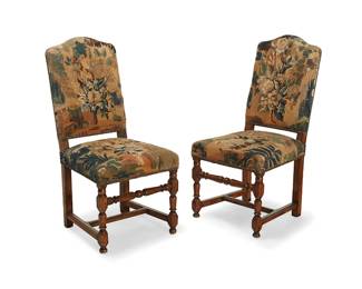 237
A pair of Louis XIII-style turned wood chairs
19th century
Each seat and seatback with verdure tapestry upholstery and brass tacking
2 pieces
Each: 41" H x 19.5" W x 22" D
Estimate: $300 - $500
