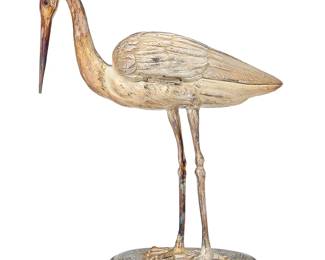 14
A Dutch sterling silver figure of a stork
Late 19th century
With British import marks for London, date marked, and further marked: 930
With inset red glass eyes and hinged wings, standing on an oval base decorated with foliage, mounted on an ebonized plinth
13" H x 5.5" W x 10.5" D
Estimate: $800 - $1,200