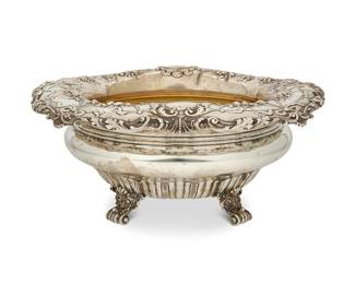 390
A Gorham sterling silver footed bowl
Early 20th century
Marked for Gorham and for sterling; numbered: A1753
With a gilt interior and repoussé ribbon and pomegranate motifs to rim, raised on scrolled feet
4.75" H x 12.25" Dia.
46.5 oz. troy approximately
Estimate: $1,000 - $1,500