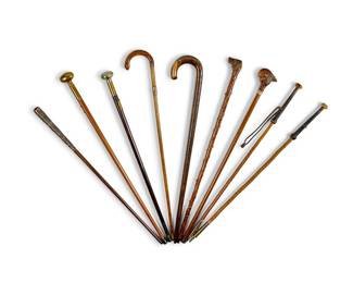 39
A group of nine wood walking sticks
20th century
Comprising four metal-mounted sticks, one with a carved wood parrot head, another carved dog head, and other carved wood canes
9 pieces
Longest: 36.75" L
Estimate: $300 - $500